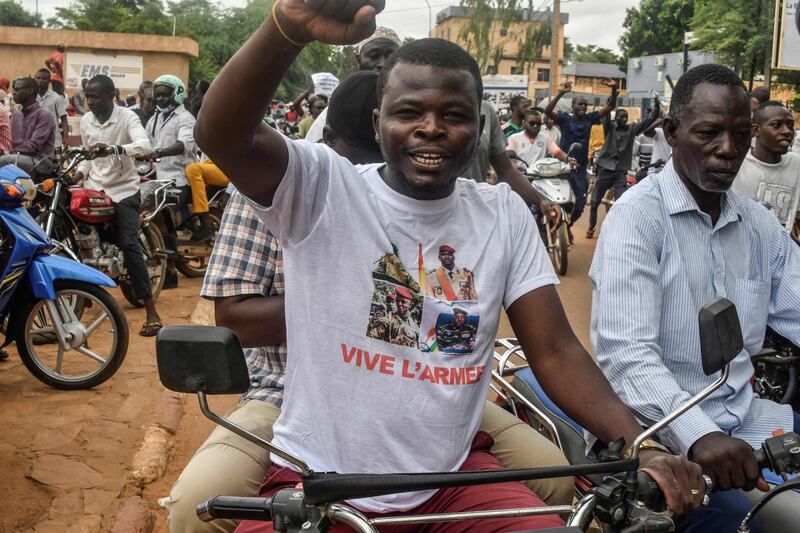 A protester wearing a T-shirt in support of the Niger junta, which staged a coup, in Niamey. AFP
