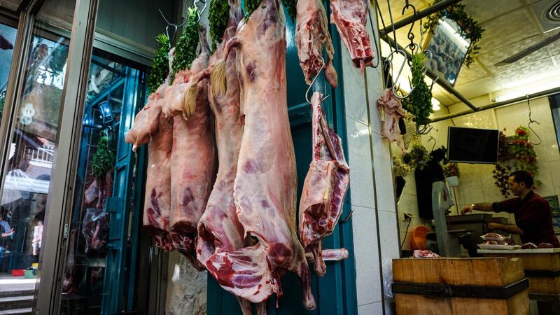 The Natsheh family have joints of lamb hung, aged, prepared and ready to be cut and swept away by Fadi for the evening's main event. Photo by Jack Moore