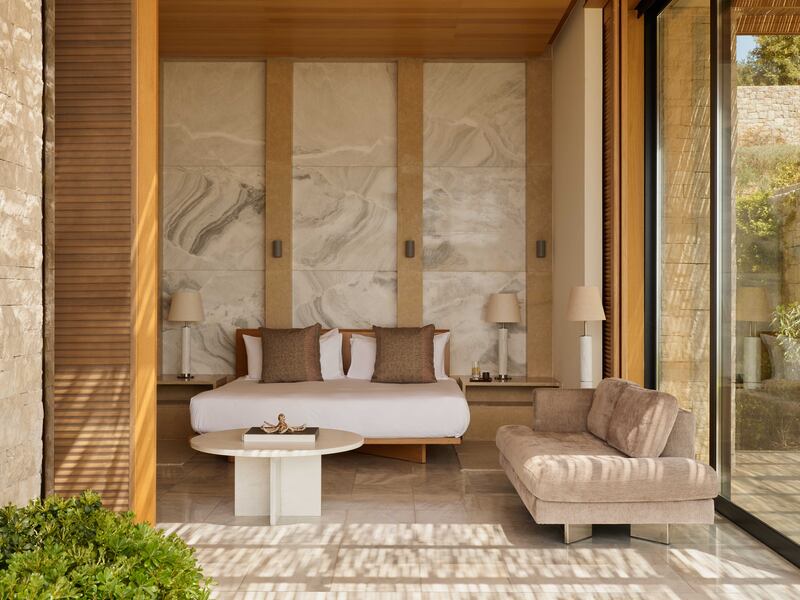 Amanzoe’s 10 villas feature open terraces with marble floors, drystone-clad walls, concrete columns and cornices
