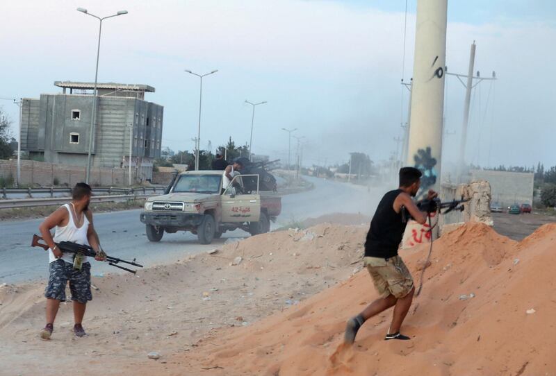 FILE PHOTO: Armed forces allied to internationally recognised government fight with armed group in Tripoli, Libya September 21, 2018. REUTERS/Hani Amara /File Photo