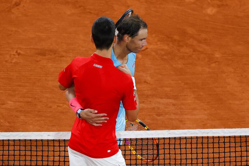 Serbia's Novak Djokovic congratulates Spain's Rafael Nadal. AFP