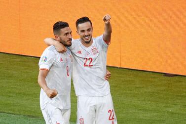 Soccer Football - Euro 2020 - Group E - Slovakia v Spain - La Cartuja Stadium, Seville, Spain - June 23, 2021 Spain's Pablo Sarabia celebrates scoring their third goal with Koke Pool via REUTERS/Julio Munoz