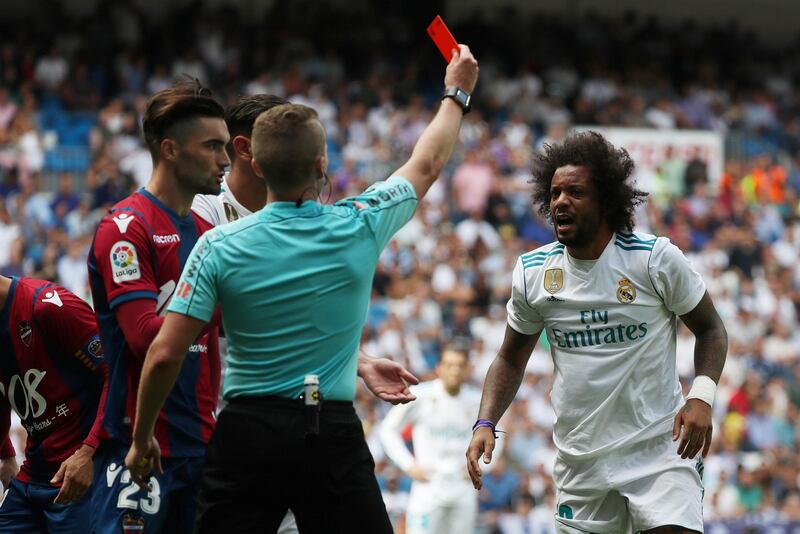 Soccer Football - Spanish La Liga Santander - Real Madrid vs Levante - Madrid, Spain - September 9, 2017   Real Madrid’s Marcelo is shown a red card by referee Alejandro Jose Hernandez Hernandez   REUTERS/Susana Vera