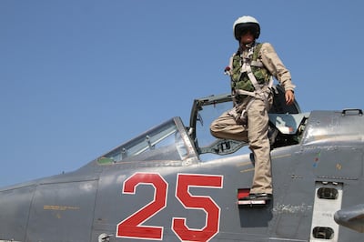 A picture taken on October 3, 2015 shows a Russian army pilot leaving the cockpit of a Russian Sukhoi Su-25 ground attack aircraft at the Hmeimim airbase in the Syrian province of Latakia. AFP PHOTO / KOMSOMOLSKAYA PRAVDA / ALEXANDER KOTS
*RUSSIA OUT* (Photo by ALEXANDER KOTS / KOMSOMOLSKAYA PRAVDA / AFP) / Russia OUT