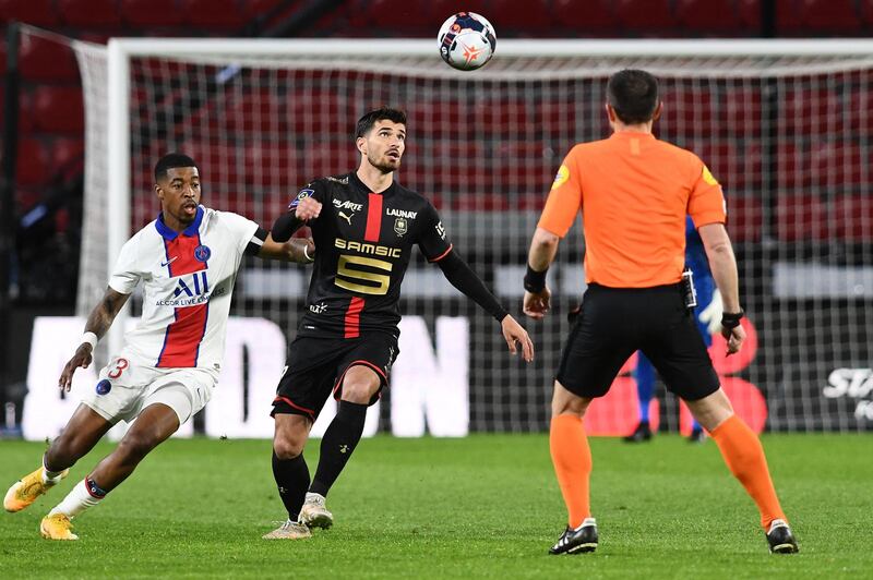 Presnel Kimpembe challenges Rennes forward Martin Terrier. AFP