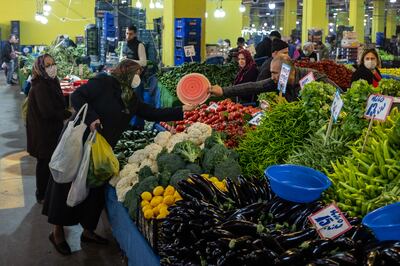  People shop for fresh fruit and vegetables at an open-air market  in Istanbul, Turkey. Getty Images