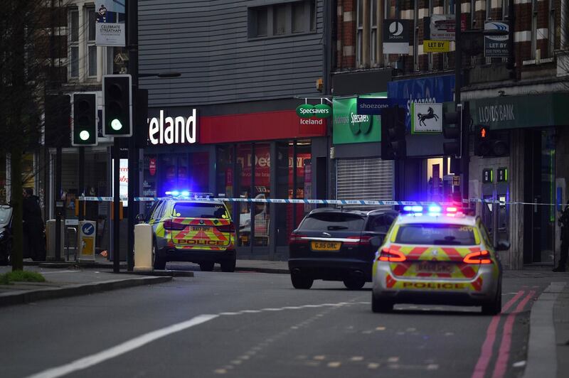 Police attend the scene after an incident in Streatham, London, Sunday Feb. 2, 2020. London police say officers shot a man during a â€œterrorism-related incidentâ€ that involved the stabbings of â€œa number of people.â€ (Kirsty O'Connor/PA via AP)