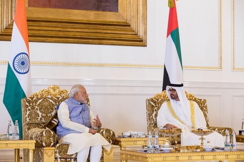 ABU DHABI, UNITED ARAB EMIRATES - August 16, 2015: HH Sheikh Mohamed bin Zayed Al Nahyan, Crown Prince of Abu Dhabi and Deputy Supreme Commander of the UAE Armed Forces (R), meets with HE Narendra Modi, Prime Minister of India (L), at the Presidential Airport. 
( Ryan Carter / Crown Prince Court - Abu Dhabi ) *** Local Caption ***  20150816RC_C066498.jpg