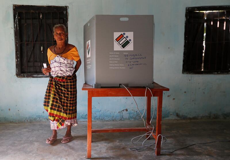 A woman leaves after casting her vote in Majuli. Reuters
