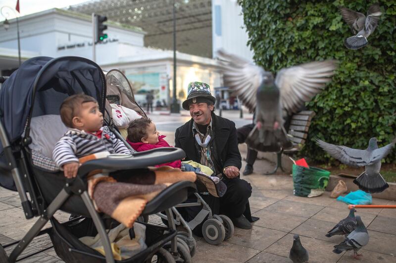 Charlie Chaplin impersonator Belhussein Abdelsalam performs for children in Rabat. To residents in the area, he is known simply as Charlo. AP Photo