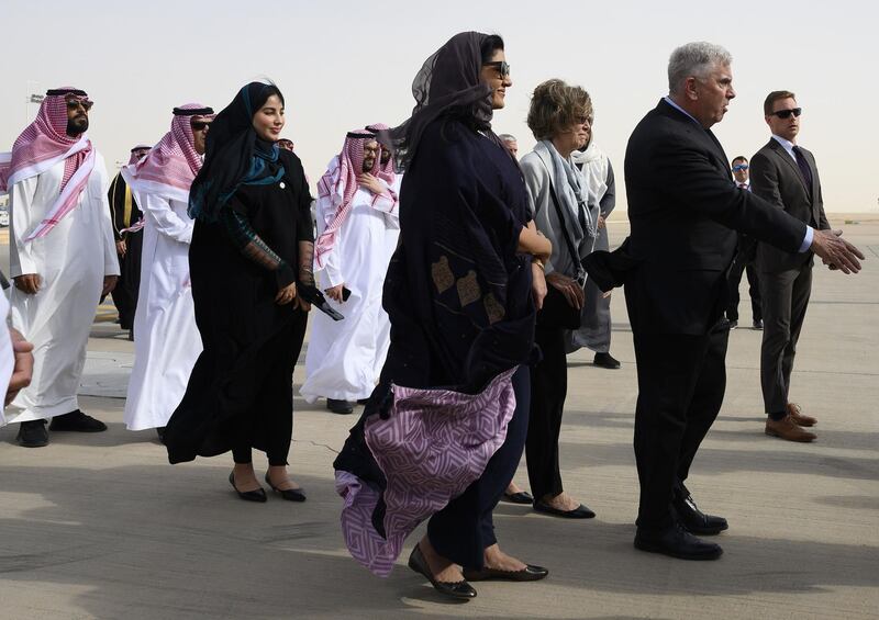 Saudi Princess Reema bint Bandar al-Saud (C) and ambassador Azzam al-Ghain (R), Deputy Foreign Minister for Protocol Affairs, wait for the arrival of US Secretary of State Mike Pompeo in Riyadh.  AFP