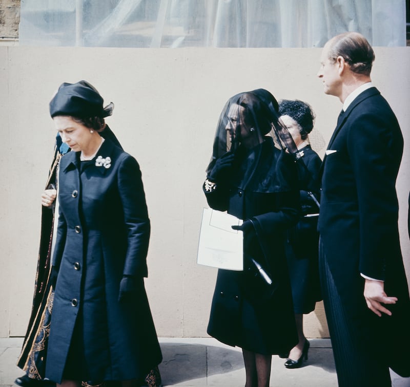 For the funeral service of the Duke of Windsor, formerly King Edward VIII on June 3, 1972 at Windsor Chapel, Queen Elizabeth II (left) is seen wearing pearls, as is the Duchess of Windsor and Queen Elizabeth, The Queen Mother. Getty Images