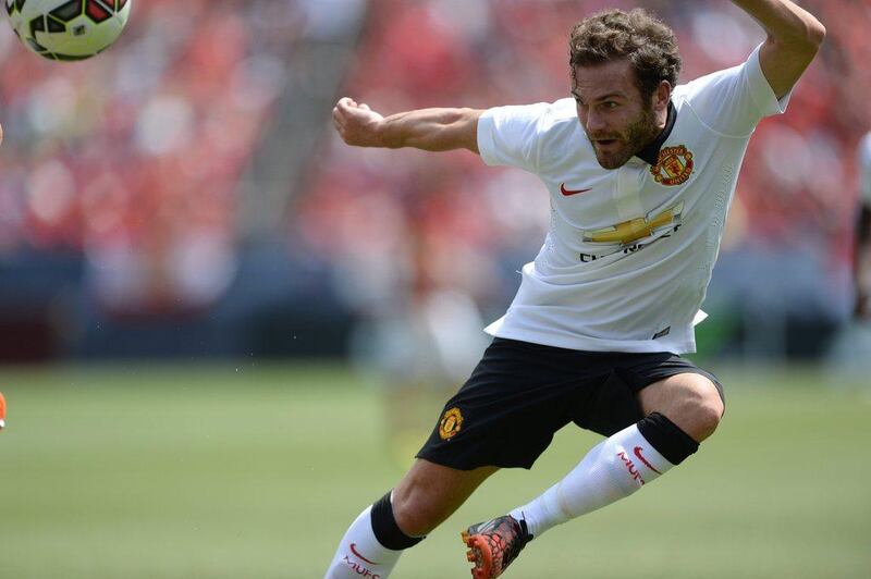 Juan Mata scores against As Roma on Saturday in Manchester United's 3-2 victory in the International Champions Cup. Ron Chenoy / USA Today Sports / July 26, 2014