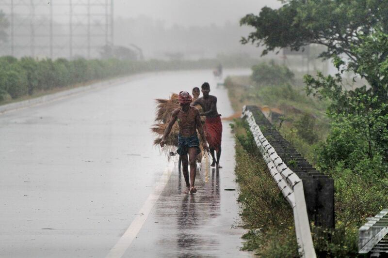 Villagers in Puri move to safer places. AP Photo