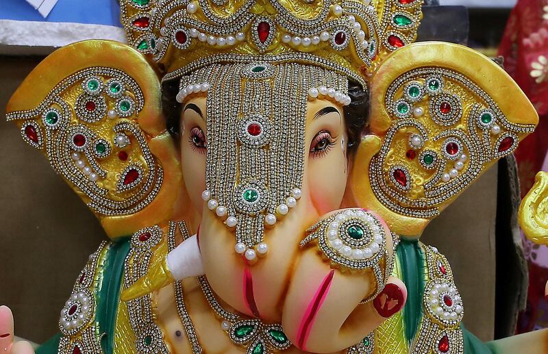 DUBAI, UNITED ARAB EMIRATES , August 17 – 2020 :- Colourful Ganesh statue made by plaster of paris on display at the Madhoor store in Bur Dubai in Dubai. Ganesh Festival will start on 22nd August. Authorities in the UAE are advising the Indian community to limit the number to immediate family members to prevent the spread of the coronavirus. (Pawan Singh / The National) For News/Online/Instagram. Story by Ramola