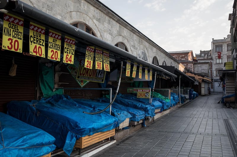 Market shops are shut along an empty street in Eminonu during a two-day lockdown imposed prevent the spread of Covid-19 in Istanbul, Turkey. Getty Images