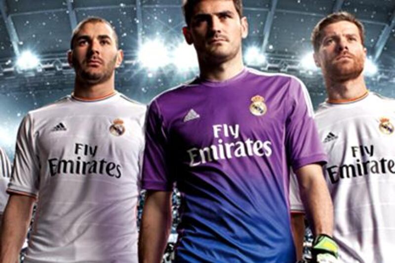 WEB USE ONLY - VERY SMALL FILE
Real Madrid new kit as seen on the Real Madrid online store with new sponsorship Fly Emirates. 