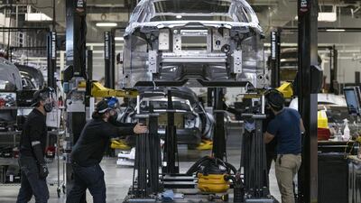 Workers assemble the Lucid Air prototype at the company's headquarters in Newark, California. Bloomberg