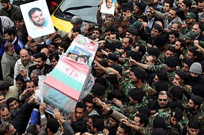 Mourners carry the coffin of an Iranian major general, Hassan Moqaddam, last week. He was one of 17 Revolutionary Guards killed in a munitions blast, which Iran said was caused during weapons research.