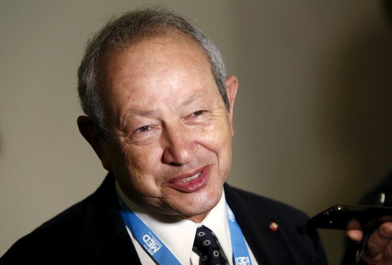 FILE PHOTO: Egyptian billionaire Naguib Sawiris answers journalists' questions during the "Rome 2015 MED, Mediterranean dialogues" forum in Rome, Italy, December 10, 2015. REUTERS/Remo Casilli/File Photo