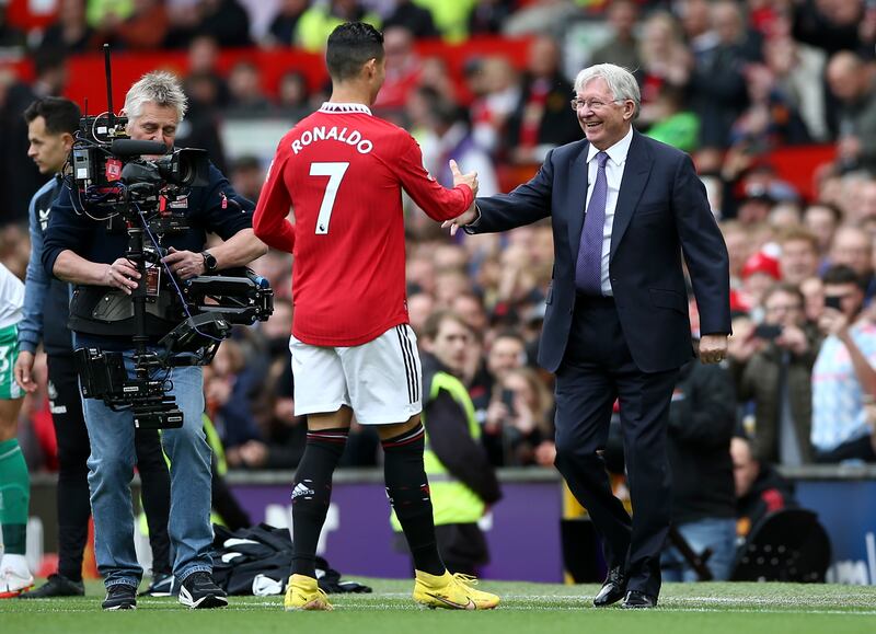 Former Manchester United manager Sir Alex Ferguson greets Cristiano Ronaldo before the game. EPA