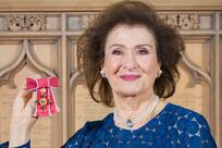 Haifa Al Kaylani receives OBE during 'moving' investiture at Windsor Castle