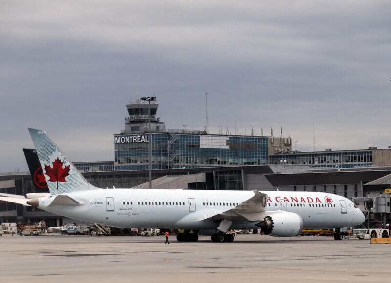 (FILES) In this file photo taken on July 16, 2019 a Boeing 787-9 Dreamliner of Air Canada sits at gate at Montréal–Pierre Elliott Trudeau International Airport (YUL). Canadians paid 1.9 percent more for goods and services in August than a year earlier, with higher air fares partly offset by lower gasoline prices, the government statistical agency said on September 18, 2019. After reaching a low of 1.4 percent in January, inflation jumped to 1.9 percent and held relatively steady for six months. In July it hit 2.0 percent.Although the economy has been strong by most macro economic indicators, Canadians have voiced growing concerns about affordability going into October national elections pitting Liberal Prime Minister Justin Trudeau, seeking a second term, against Conservative leader Andrew Scheer.
 / AFP / Daniel SLIM
