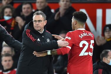 Manchester United's Jadon Sancho (R) greets interim manager Ralf Rangnick (L) after being substituted during the English Premier League match between Manchester United and Wolverhampton Wanderers in Manchester, Britain, 03 January 2022.   EPA/PETER POWELL EDITORIAL USE ONLY.  No use with unauthorized audio, video, data, fixture lists, club/league logos or 'live' services.  Online in-match use limited to 120 images, no video emulation.  No use in betting, games or single club / league / player publications