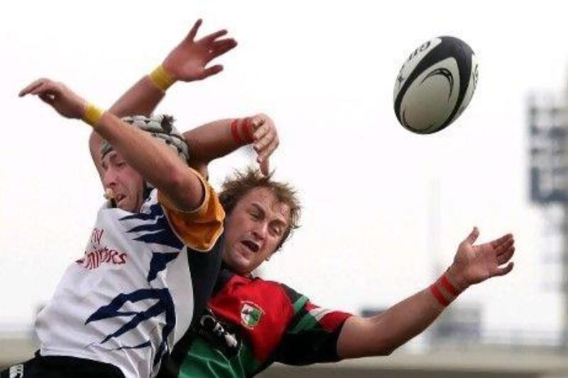 Harlequins’ Ali Thompson, right, wins the ball from a lineout.