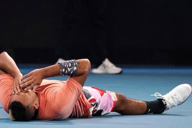 Nick Kyrgios sinks to the ground after beating Karen Khachanov in the third round of the Australian Open. AP Photo