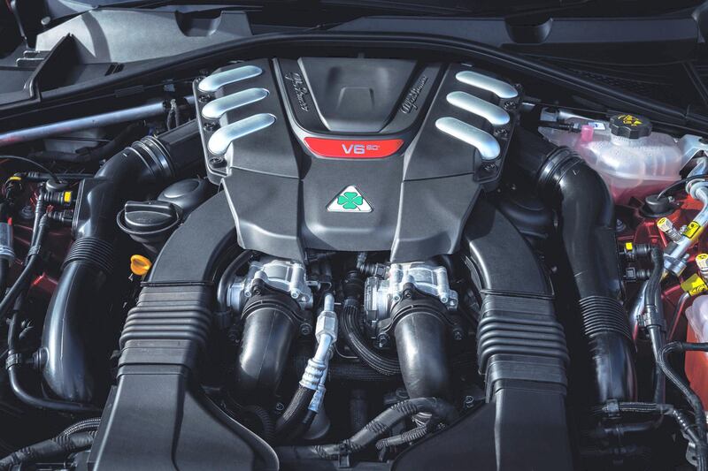 The engine bearing the Quadrifoglio badge, which takes the form of a four-leaf clover.