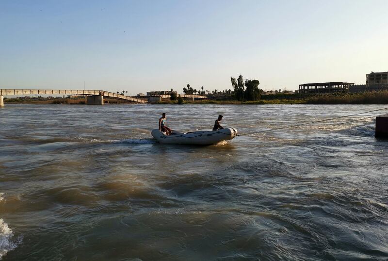 Iraqi rescuers search for survivors. Reuters