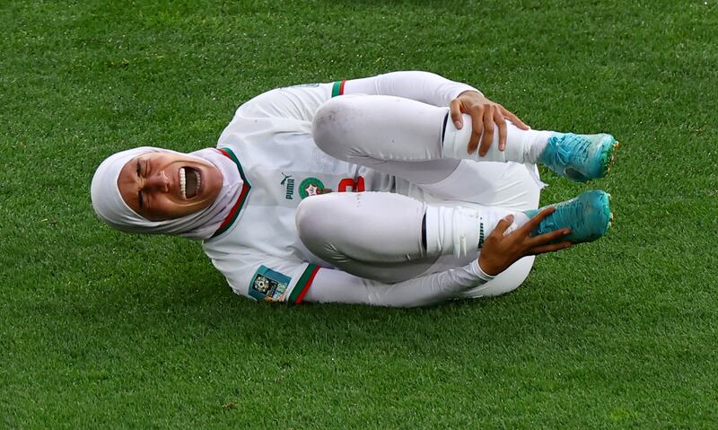Morocco's Nouhaila Benzina reacts after sustaining an injury. Reuters