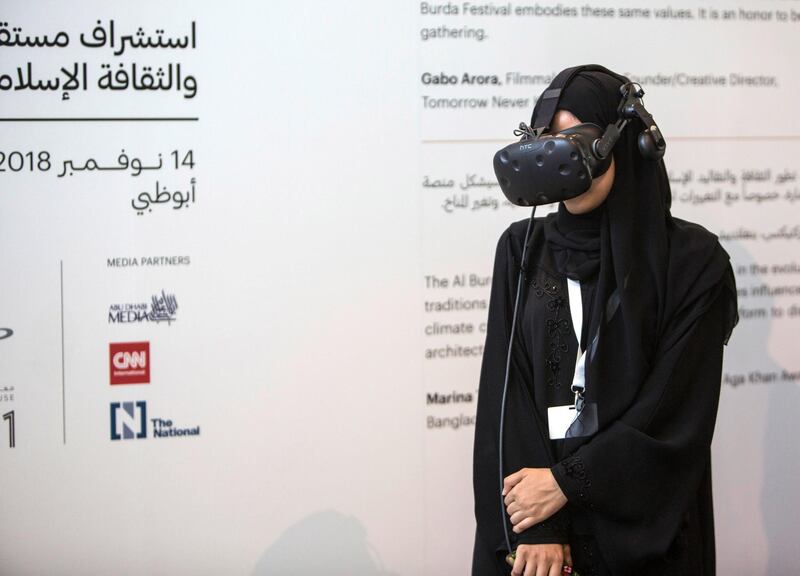 ABU DHABI, UNITED ARAB EMIRATES -Trying out the virtual reality at the Al Burda Festival, Shaping the Future of Islamic Art and Culture at Warehouse 421, Abu Dhabi.  Leslie Pableo for The National for Melissa Gronlund���s story