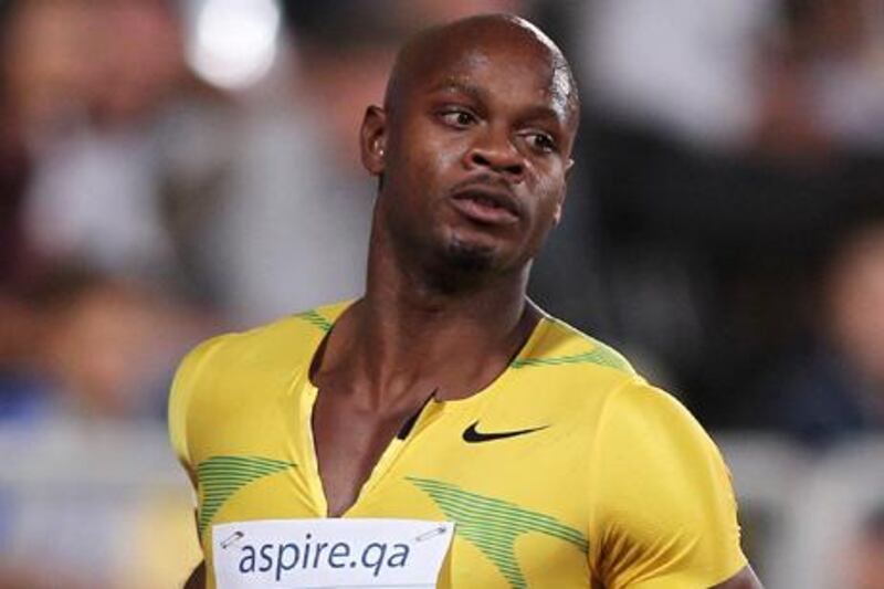Jamaica's Asafa Powell competes in the men's 100m race during the IAAF Diamond League series in the Qatari capital Doha on May 14, 2010. Powell won the 100m in a time of 9.81sec. AFP PHOTO/KARIM JAAFAR