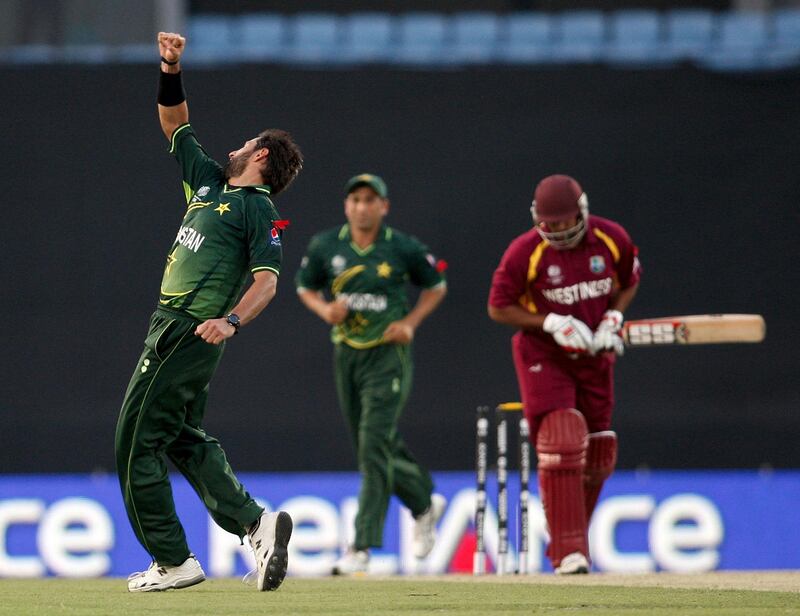 DHAKA, BANGLADESH - MARCH 23:  Shahid Afridi of Pakistan celebrates the wicket of Ravi Rampaul of West Indies during the first ICC 2011 World Cup quarter final at Shere-e-Bangla National Stadium on March 23, 2011 in Dhaka, Bangladesh.  (Photo by Graham Crouch/Getty Images)