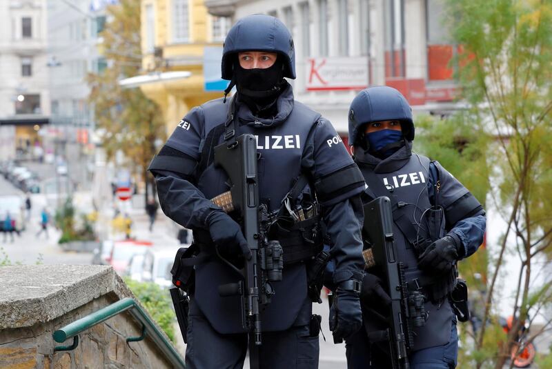 FILE PHOTO: Armed police officers patrol near the site of a gun attack in Vienna, Austria, November 4, 2020. REUTERS/Leonhard Foeger/File Photo