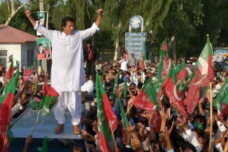 Cricket star turned politician Imran Khan organised a defiant march against US drone strikes on Pakistan, which could help him boost his popularity ahead of elections.