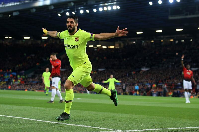 Luis Suarez celebrates after his header forced the only goal of the game. AP Photo