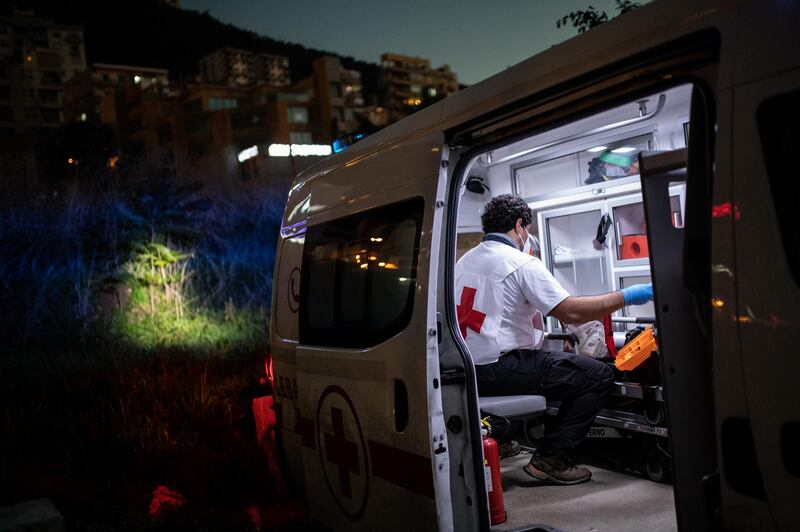 ©2021 Tom Nicholson. 23/01/2021. Jounieh, Lebanon. A Lebanese Red Cross volunteer paramedic prepares equipment ahead of a night shift at the Jounieh station. Today Lebanon registered 4176 new Coronavirus cases, and 52 deaths. Tom Nicholson for The National