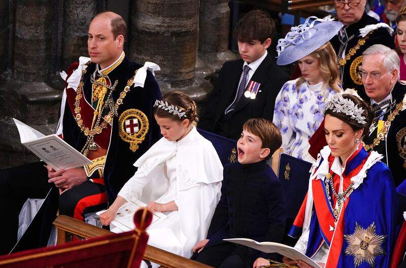 Prince William, Prince of Wales, Princess Charlotte, Prince Louis and Catherine, Princess of Wales attend the Coronation. Getty