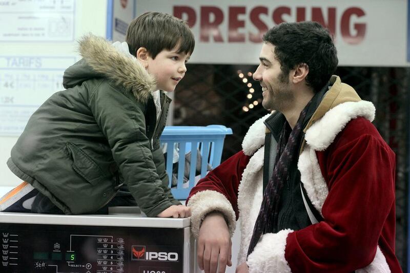 Taher Rahim as Santa in La P`ere Noël. 