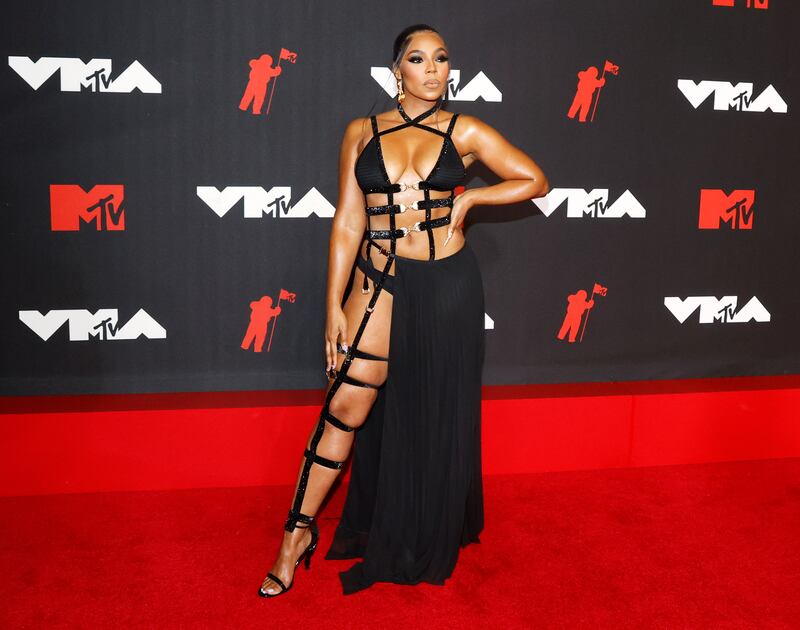 US singer Ashanti, in Michael Costello, arrives on the MTV Video Music Awards red carpet.