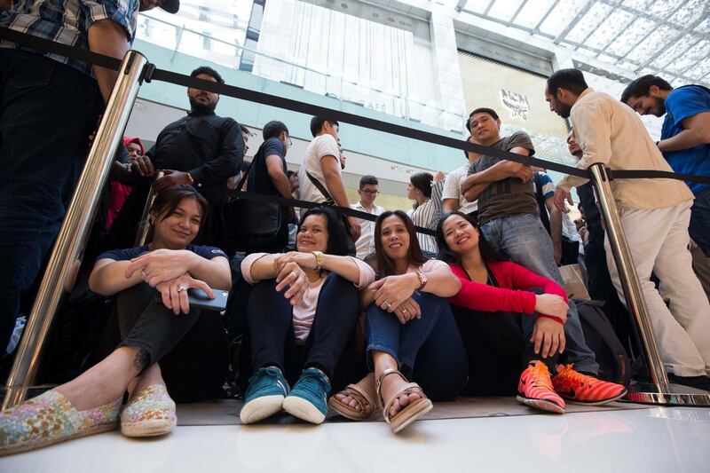 DUBAI, UNITED ARAB EMIRATES, 21 SEPTEMBER 2018 - Crowd at Iphone XS launch at Apple store Dubai Mall.  Leslie Pableo for The National