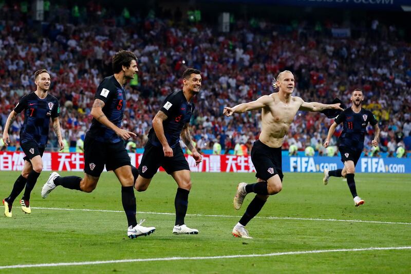 Croatia's Domagoj Vida celebrates with his teammates after scoring his side's second goal. Manu Fernandez/AP Photo