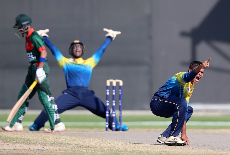 Sri Lanka's Dunith Wellalage appeals unsuccessfully at the Sharjah Cricket Stadium.