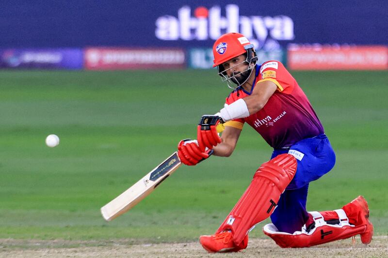 Dubai Capitals' Sikandar Raza plays a shot during the International League T20 (ILT20) tournament cricket match between Dubai Capitals and Gulf Giants at Dubai International Stadium in the Gulf emirate on January 16, 2023.  (Photo by Karim SAHIB  /  AFP)