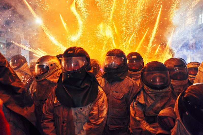 Participants wear protective clothing at the Yanshui Beehive Fireworks Festival in Tainan, Taiwan. Held on the 15th day after the beginning of the lunar new year, it is regarded as one of the world's most dangerous fireworks festivals. Hundreds of thousands of fireworks are ignited simultaneously. Getty Images