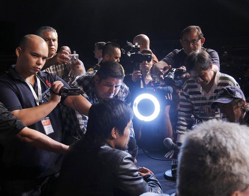 Manny Pacquiao does a media session last year in Las Vegas before he fought Timothy Bradley. Mike Young for The National / April 12, 2014