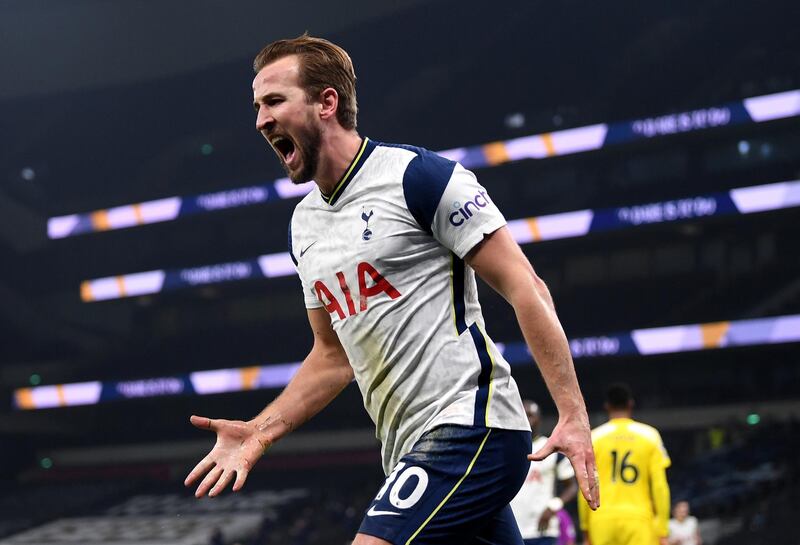 LONDON, ENGLAND - JANUARY 13:  Harry Kane of Tottenham Hotspur celebrates after scoring the first goal during the Premier League match between Tottenham Hotspur and Fulham at Tottenham Hotspur Stadium on January 13, 2021 in London, England. Sporting stadiums around England remain under strict restrictions due to the Coronavirus Pandemic as Government social distancing laws prohibit fans inside venues resulting in games being played behind closed doors. (Photo by Shaun Botterill/Getty Images)